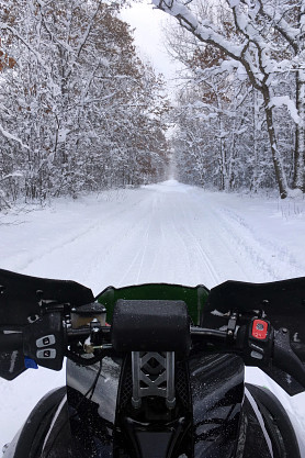 snowmobile-on-trail-in-upper-michigan.-1158855385_2976x4032.jpeg