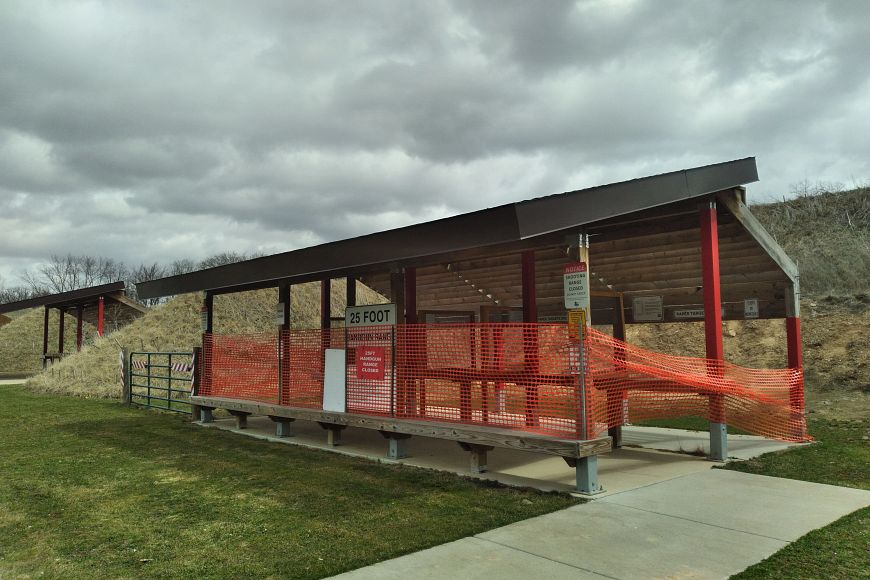 A shooting shed at the Columbia County Shooting Range, fenced off for construction.