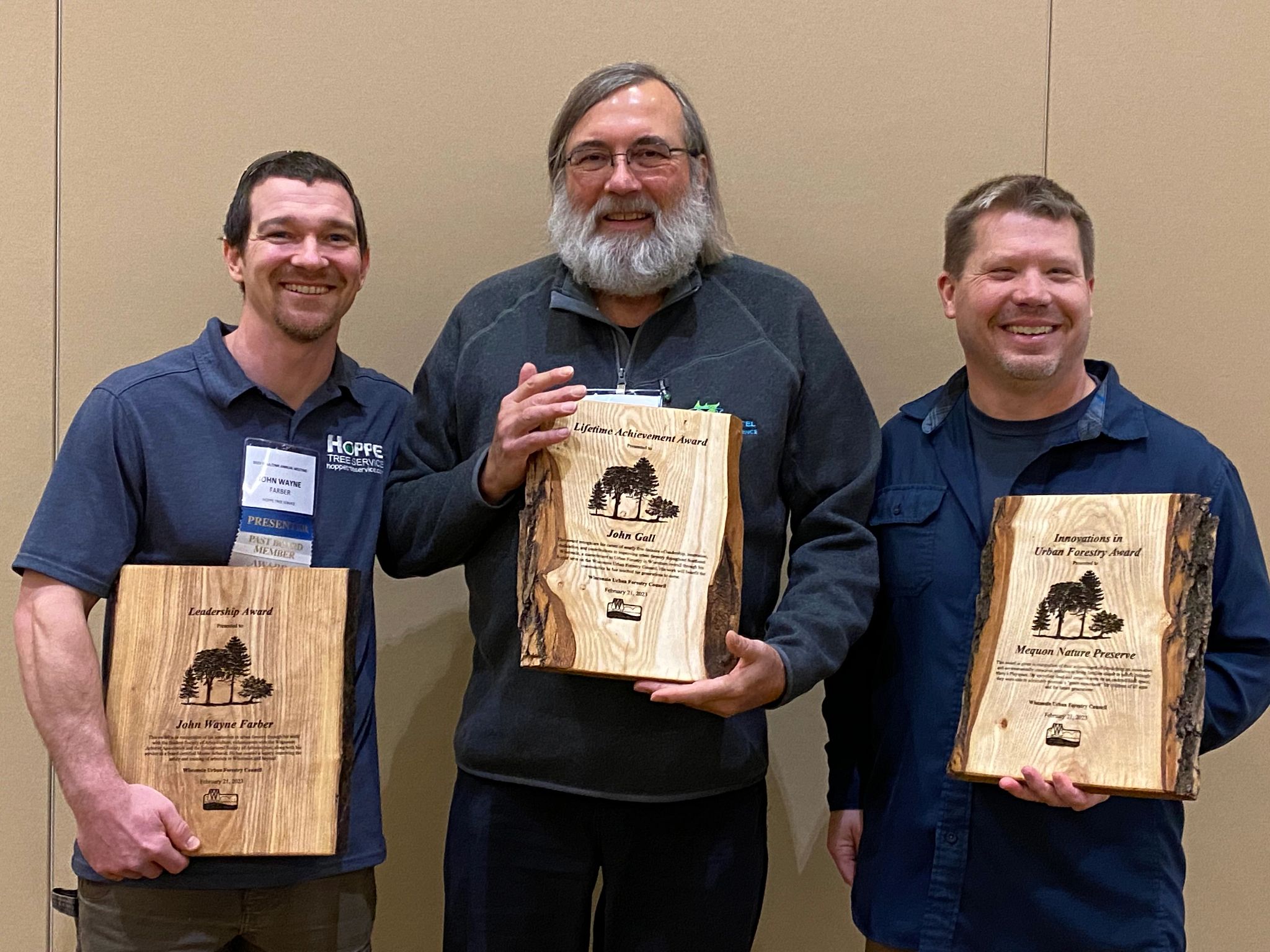 The 2023 Urban Forestry Award winners. From left to right: John Wayne Farber, Leadership Award; John Gall, Lifetime Achievement Award; Cory Gritzmacher, receiving the Innovation Award on behalf of the Mequon Nature Preserve.