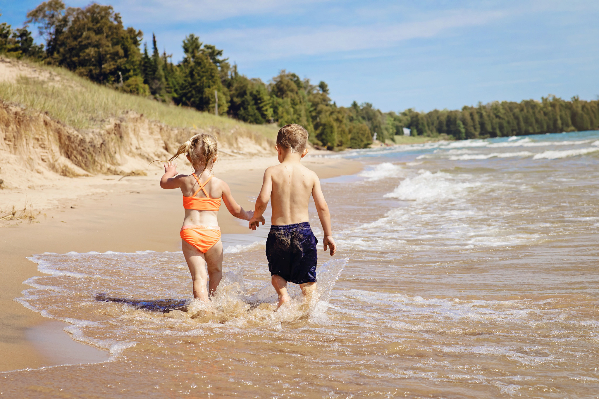 Children playing at Whitefish Dunes State Park. Generations of Wisconsinites have grown up enjoying Great Lakes beaches and rely on our lakes for safe, clean water. This photo was entered in the DNR’s 2020 Great Waters Photography Contest. 