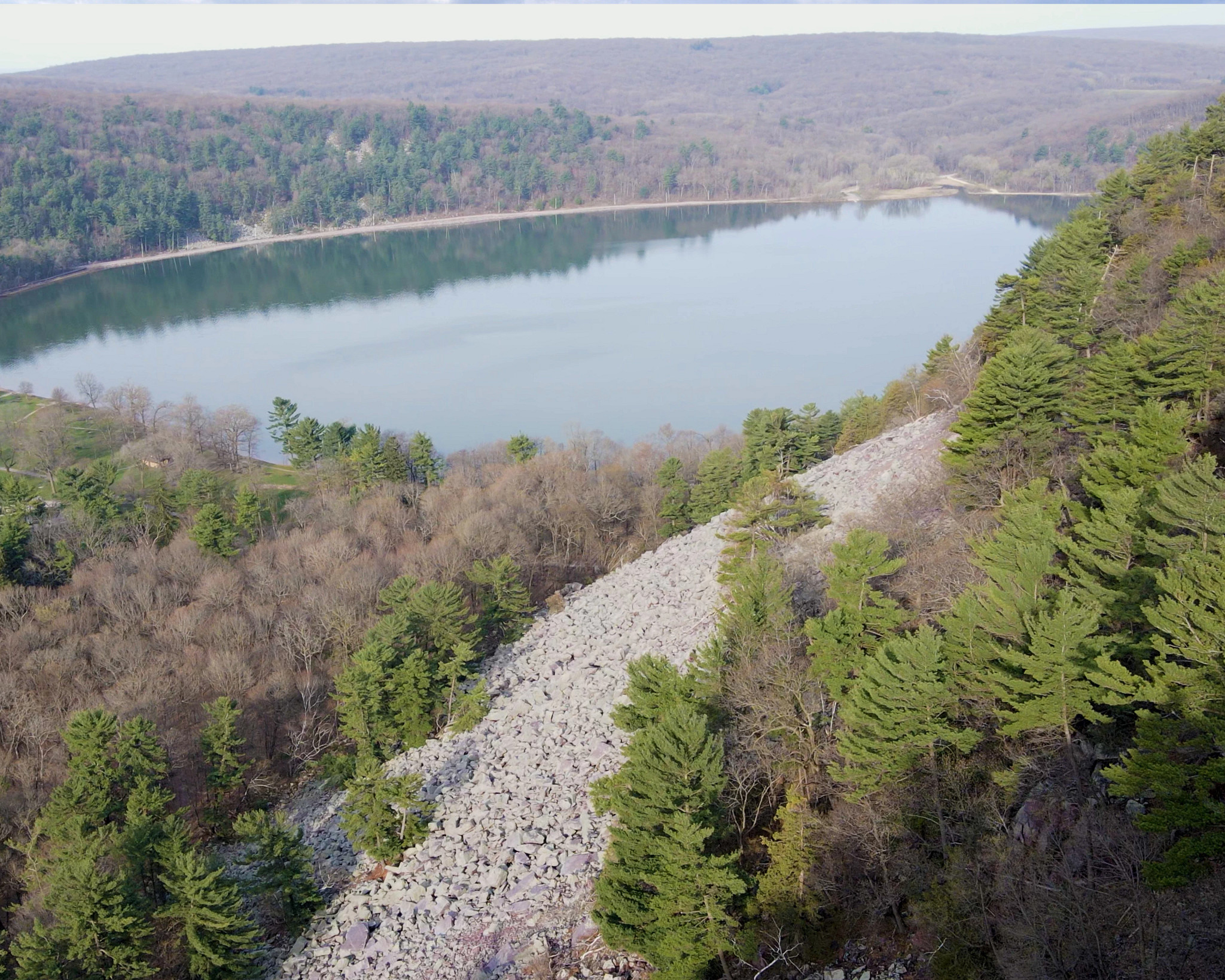A panoramic aerial view of Devils Lake State Park in the spring. 