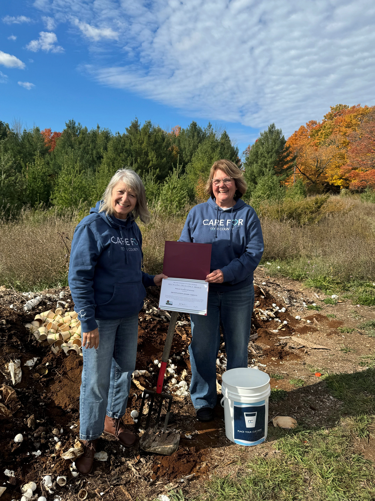 Members of Destination Door County posing with Recycling Excellence Award