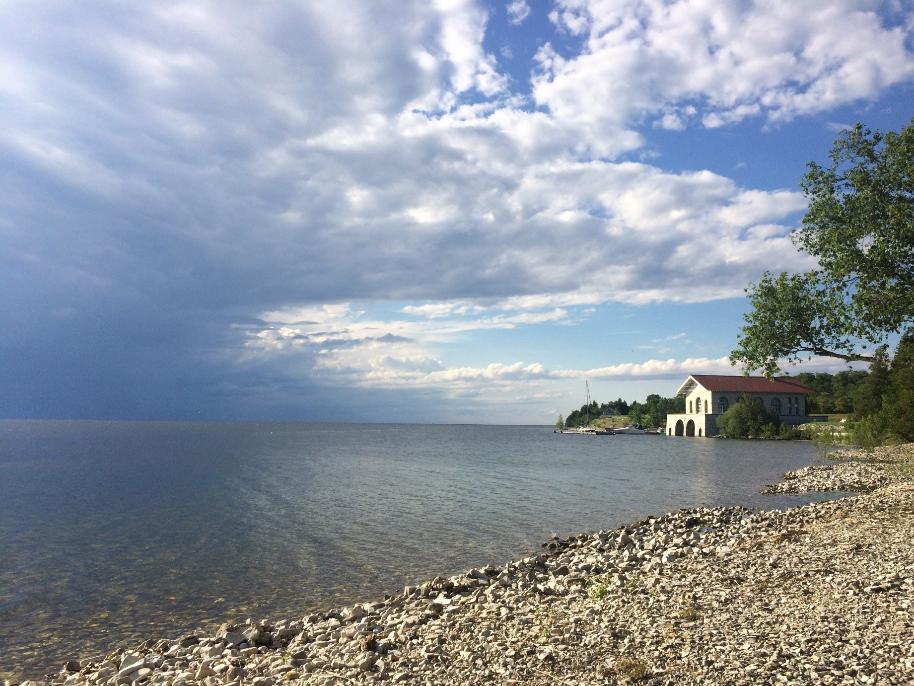 Rocky beach and historic boat house at Rock Island State Park