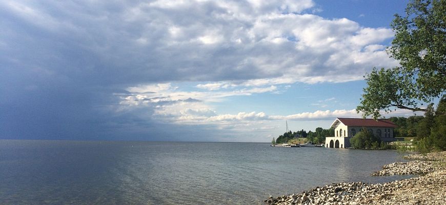 Rocky beach and historic boat house at Rock Island State Park