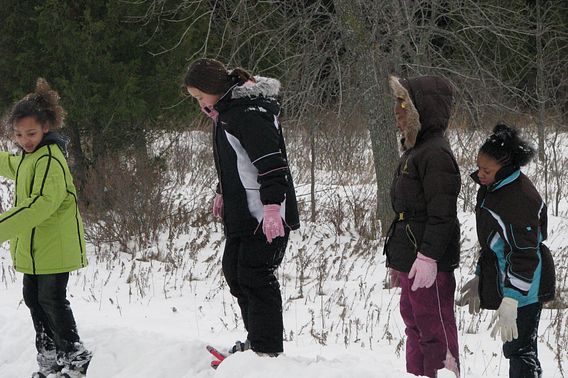 kids try snowshoeing at Potawatomi State Park