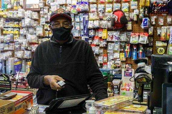 Tommy White in his store