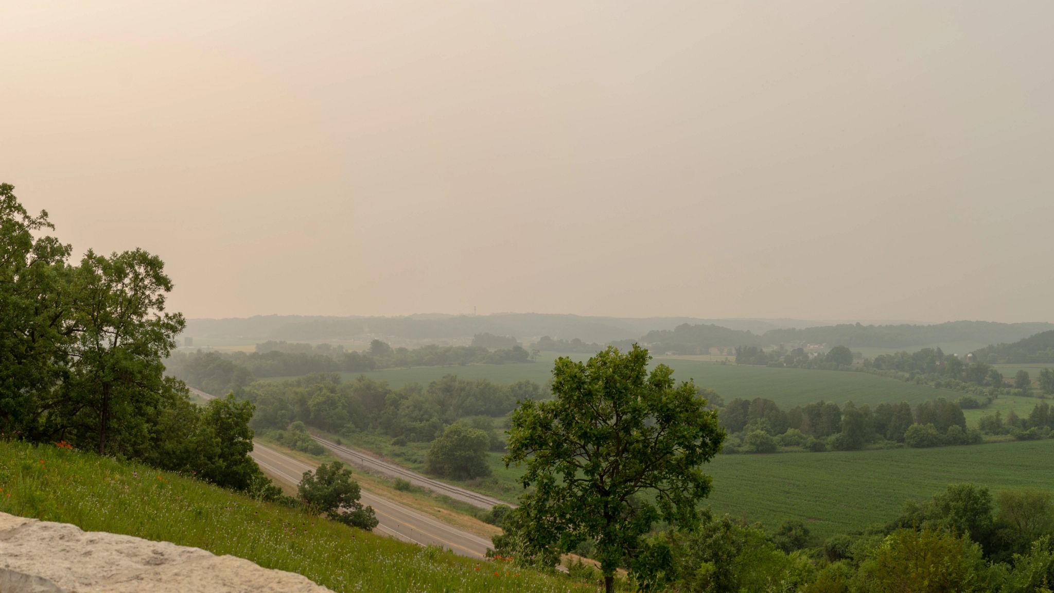 A smokey haze over the landscape at Festge County Park in Cross Plains, WI on June 27, 2023.