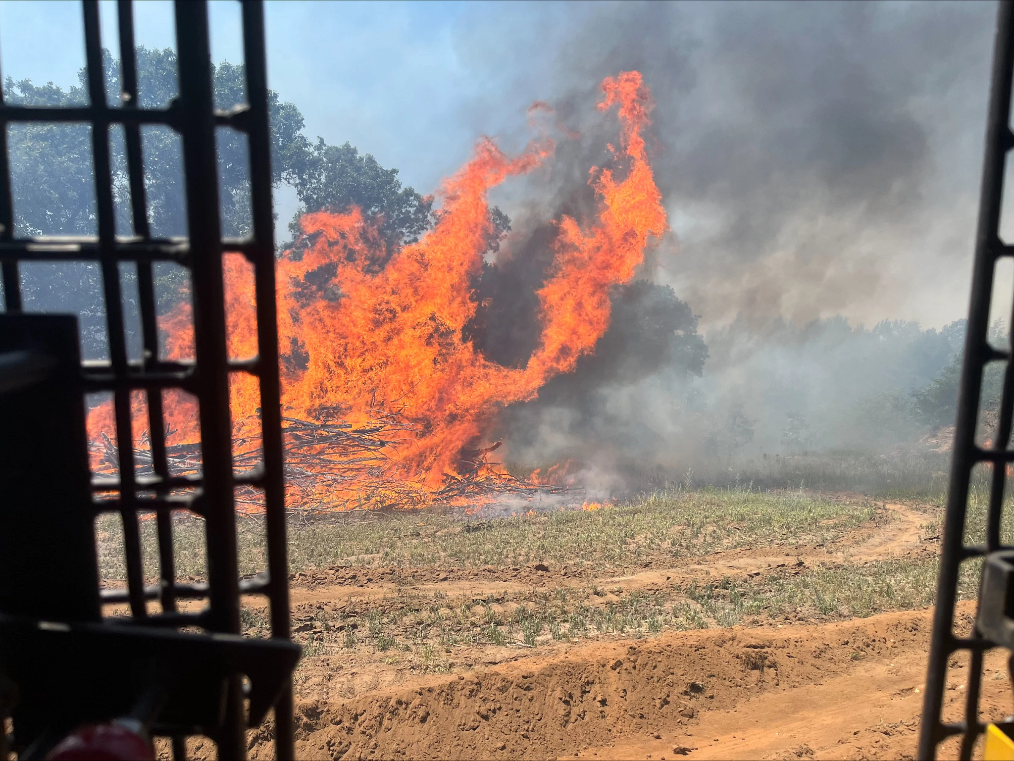huge flames across a dry field in Waushara County on July 10