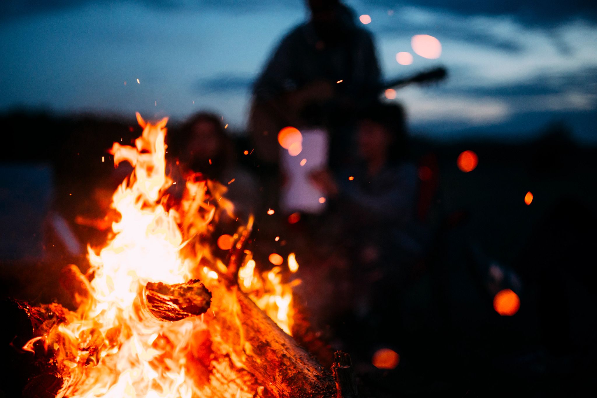 An image of a campfire at night.