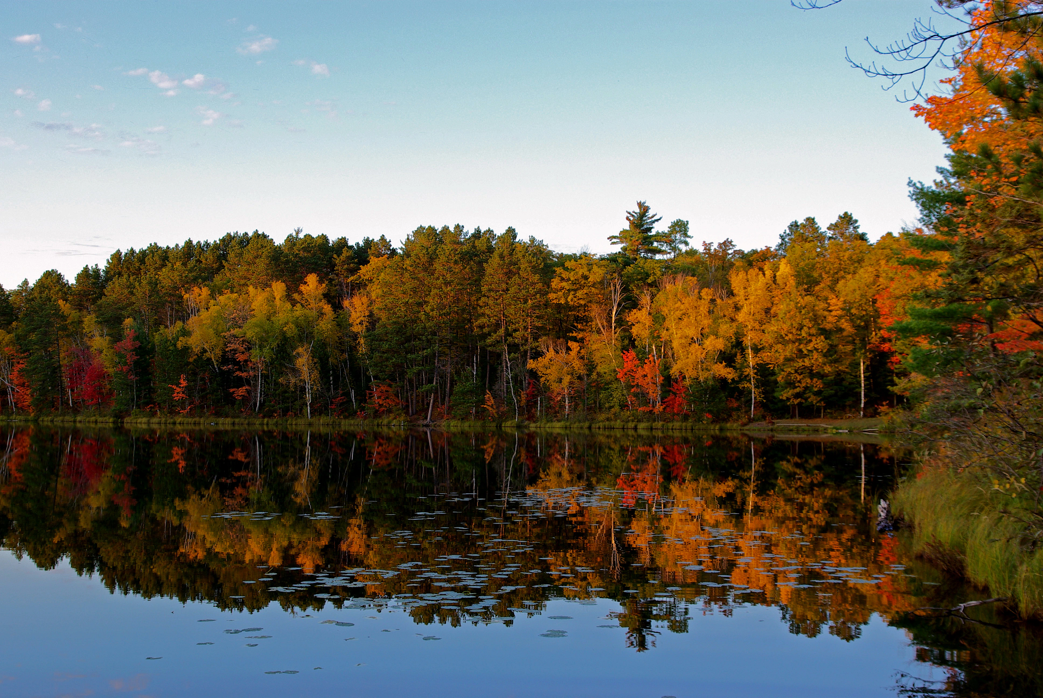 View of Cunard Lake with fall foliage reflected in the water