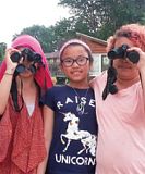 3 girls with binoculars