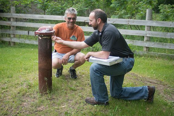 A DNR employee tests a well at the Stonefield historic site in Cassville.