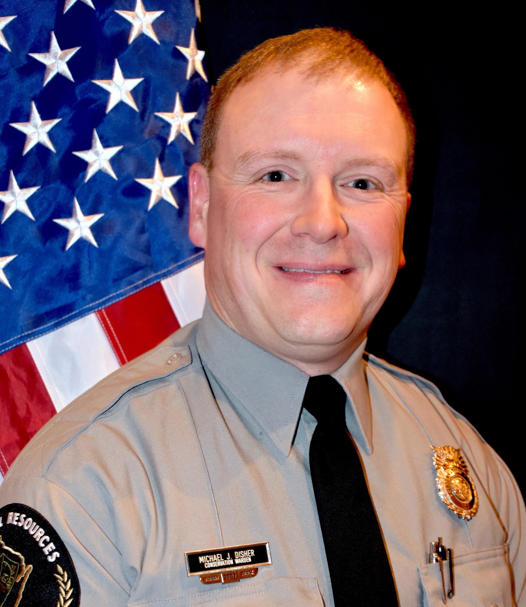 An image of  DNR Conservation Warden Mike Disher.