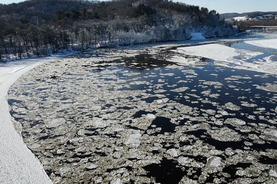 A drone picture of ice breaking on a river at Tower Hill State Park