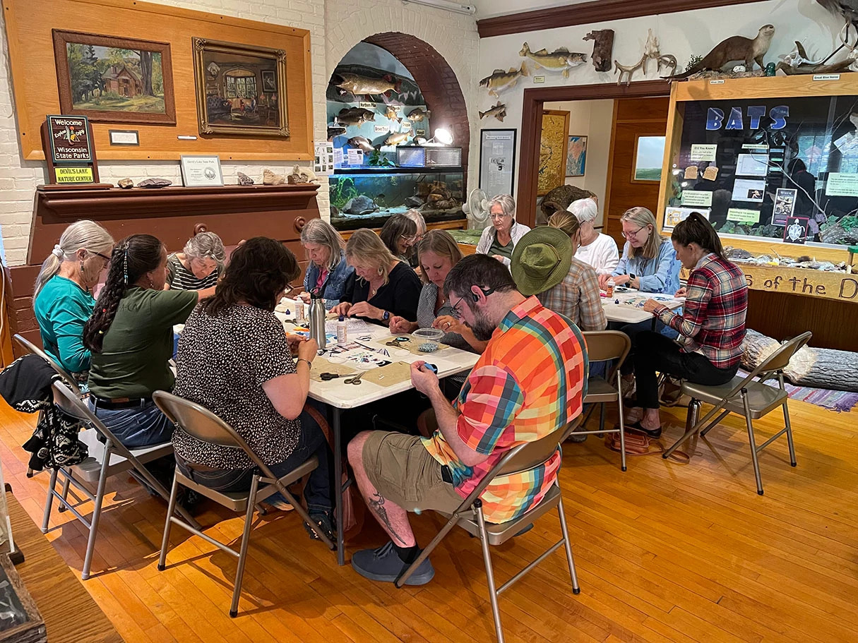 group does craft inside nature center.