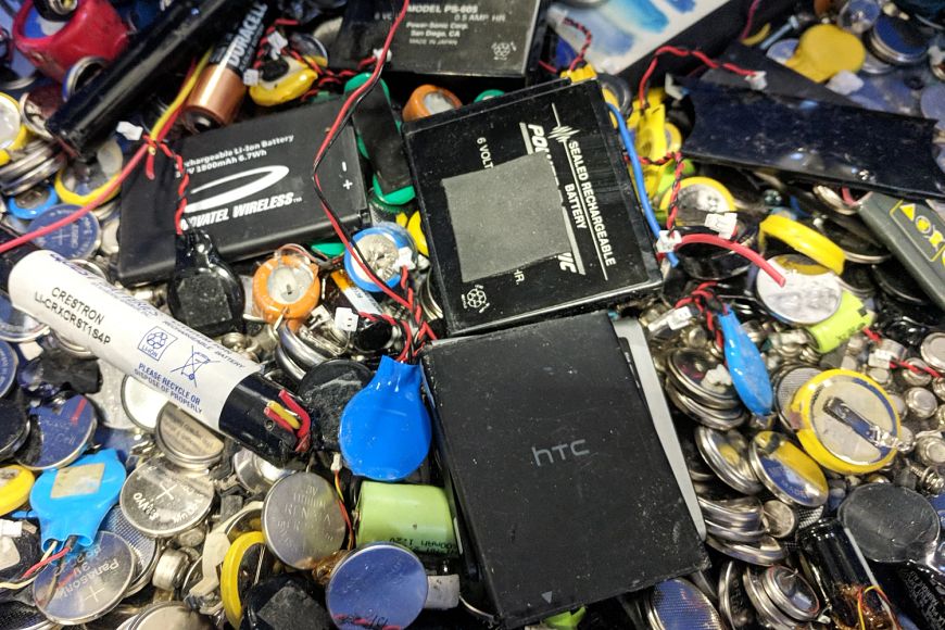 A mixture of batteries including lithium-ion, phone and button batteries.