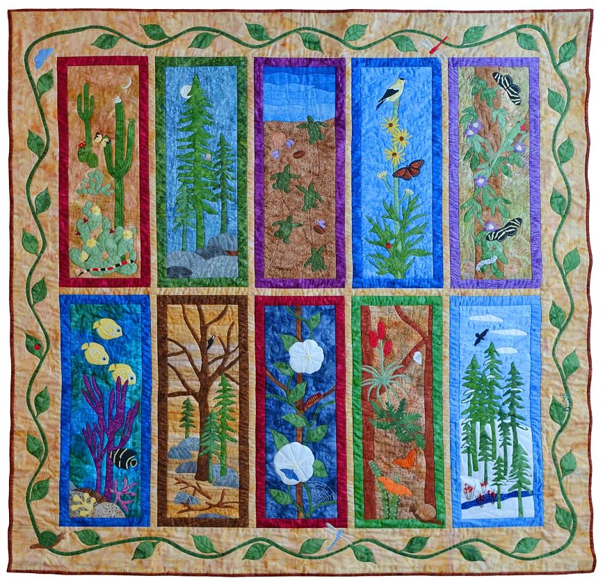 Intricately stitched nature quilt with 10 panels