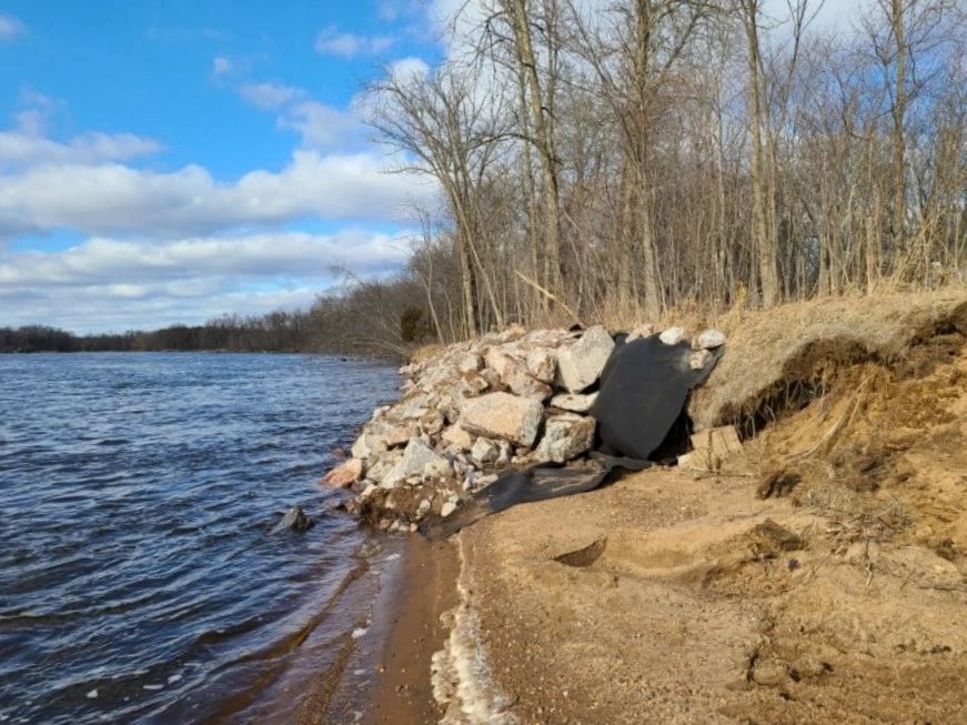 An image of a riprap constructed on a shoreline downstream from the confluence of the Tenmile Creek.