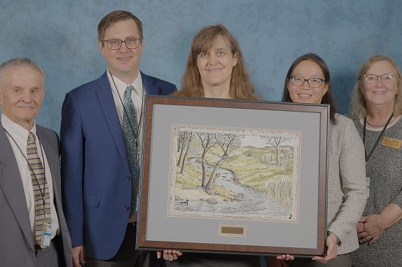 Shaili Pfeiffer poses with her award.