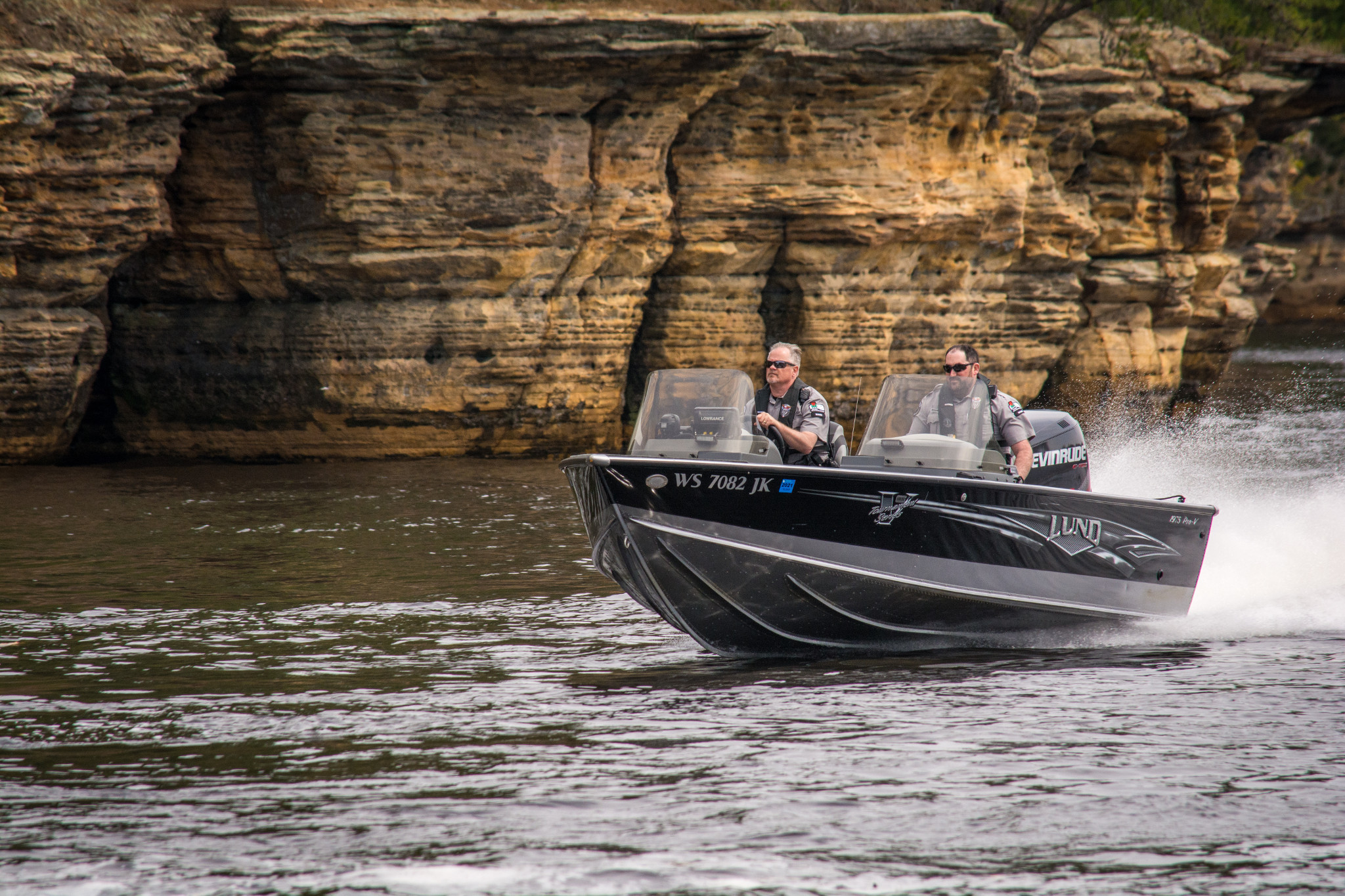 DNR wardens on a boat in Sauk County