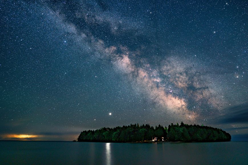 The Milky Way illuminates the pre-dawn sky above Baileys Harbor. 