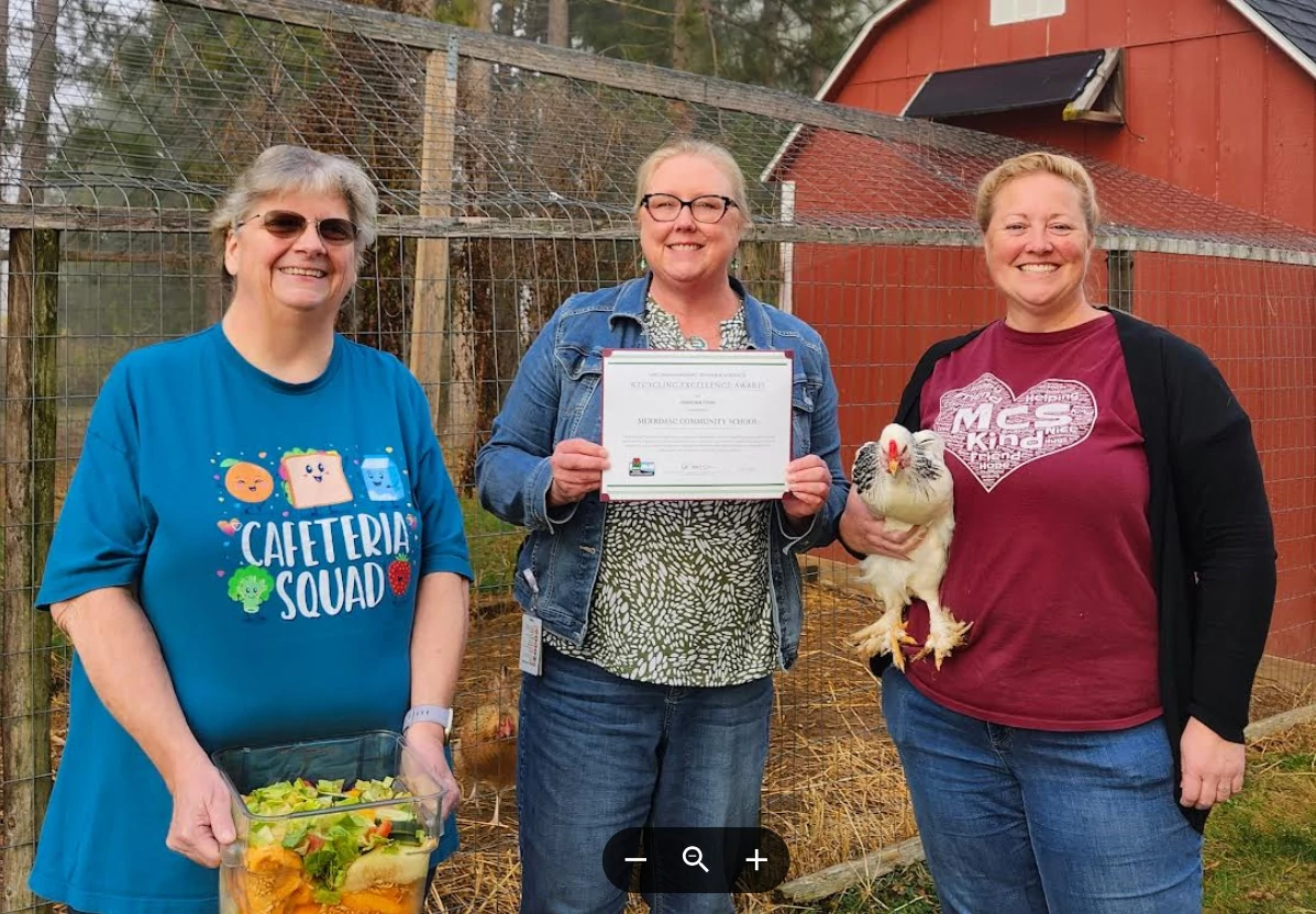Teachers from Merrimac Community School posing with Recycling Excellence Award