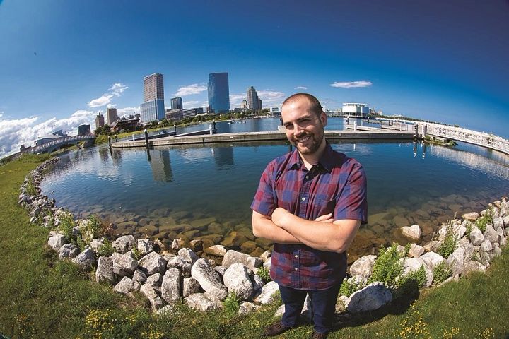 Brennan Dow standing on Milwaukee shore