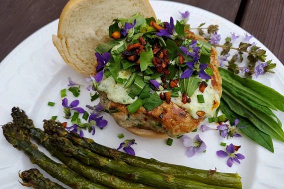 wild turkey burger and greens on a plate