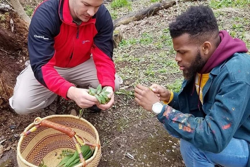 two men foraging for food