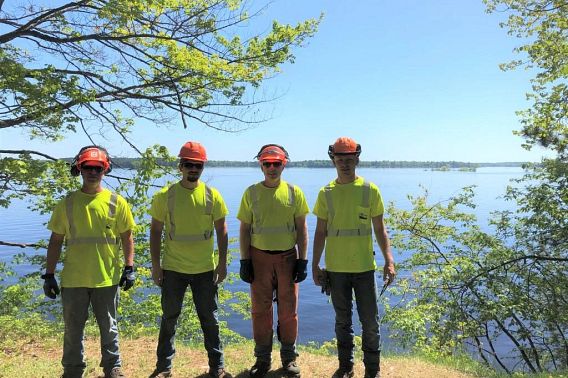A crew of park workers pose for a photo along the Willow Flowage in Oneida County. 